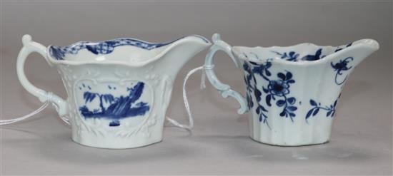 Two Worcester blue and white creamboats in the Bare Tree Pagoda and Prunus Root patterns, c.1754-60, 10.5 and 10cm long